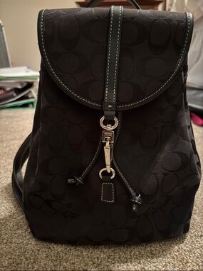 Coach Black Signature Drawstring Backpack with Silver Hardware